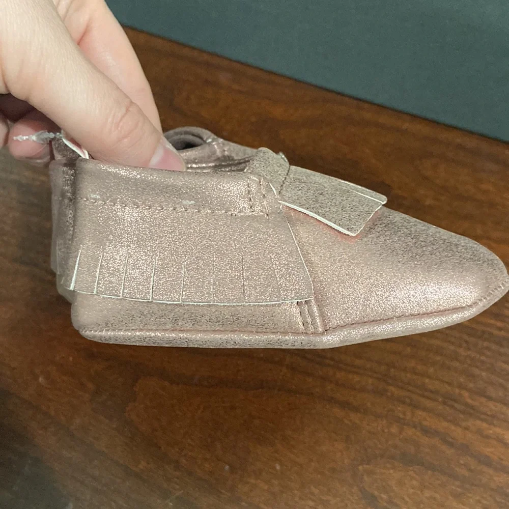 Pink shimmery, baby moccasins 6–9 months only worn for a photo shoot